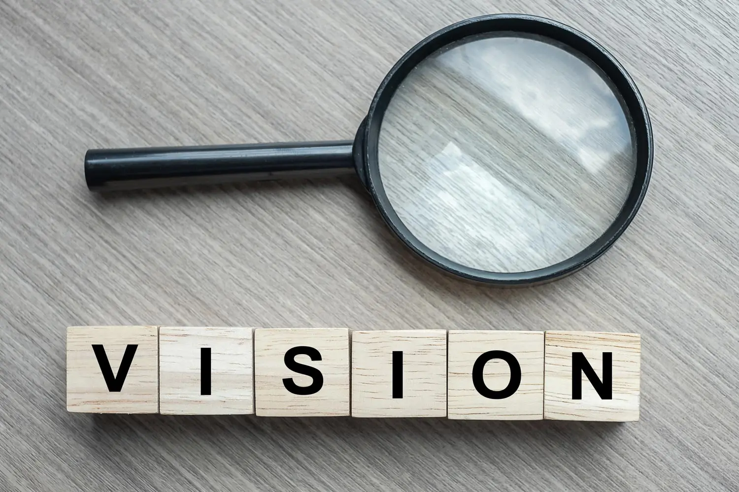 Vision spelled out with a magnifier